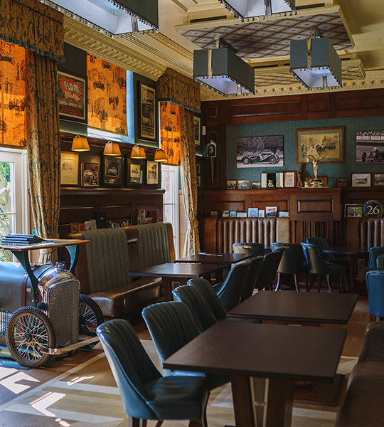 Restaurant seats with antique vehicle serving tray